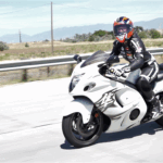 Louisa on a white Hayabusa on I-80