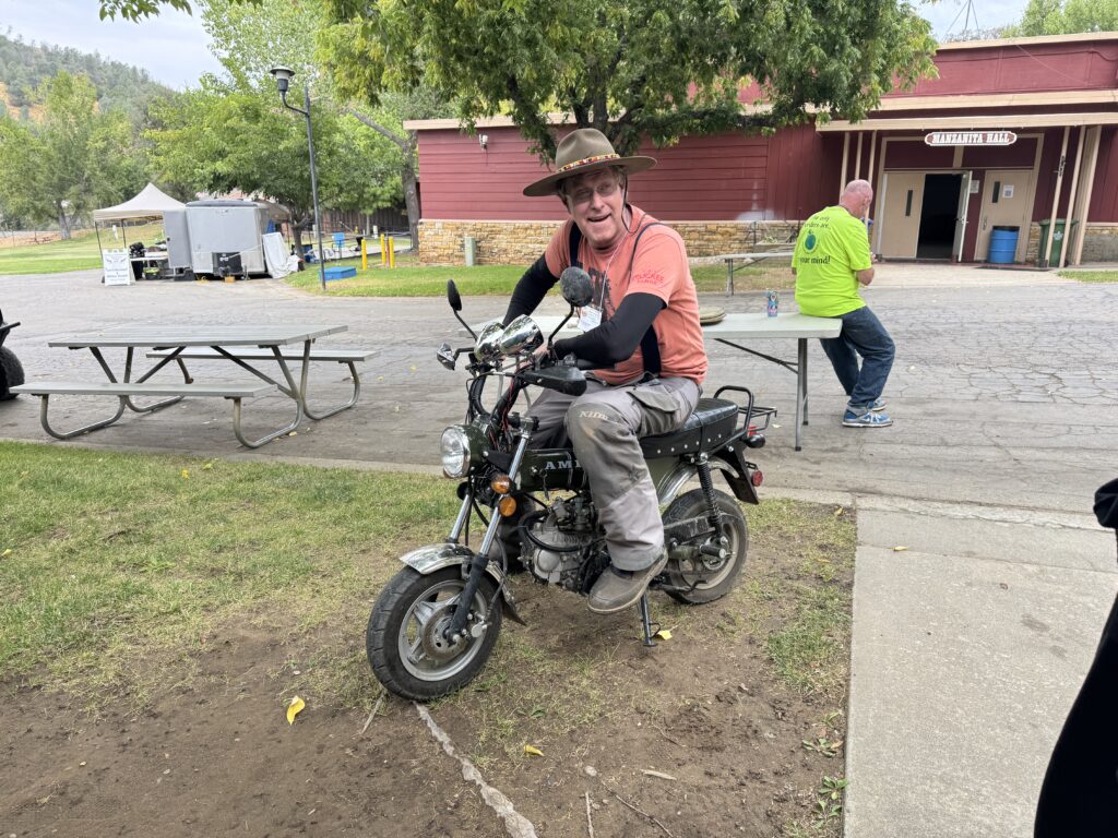 Man on small motorbike